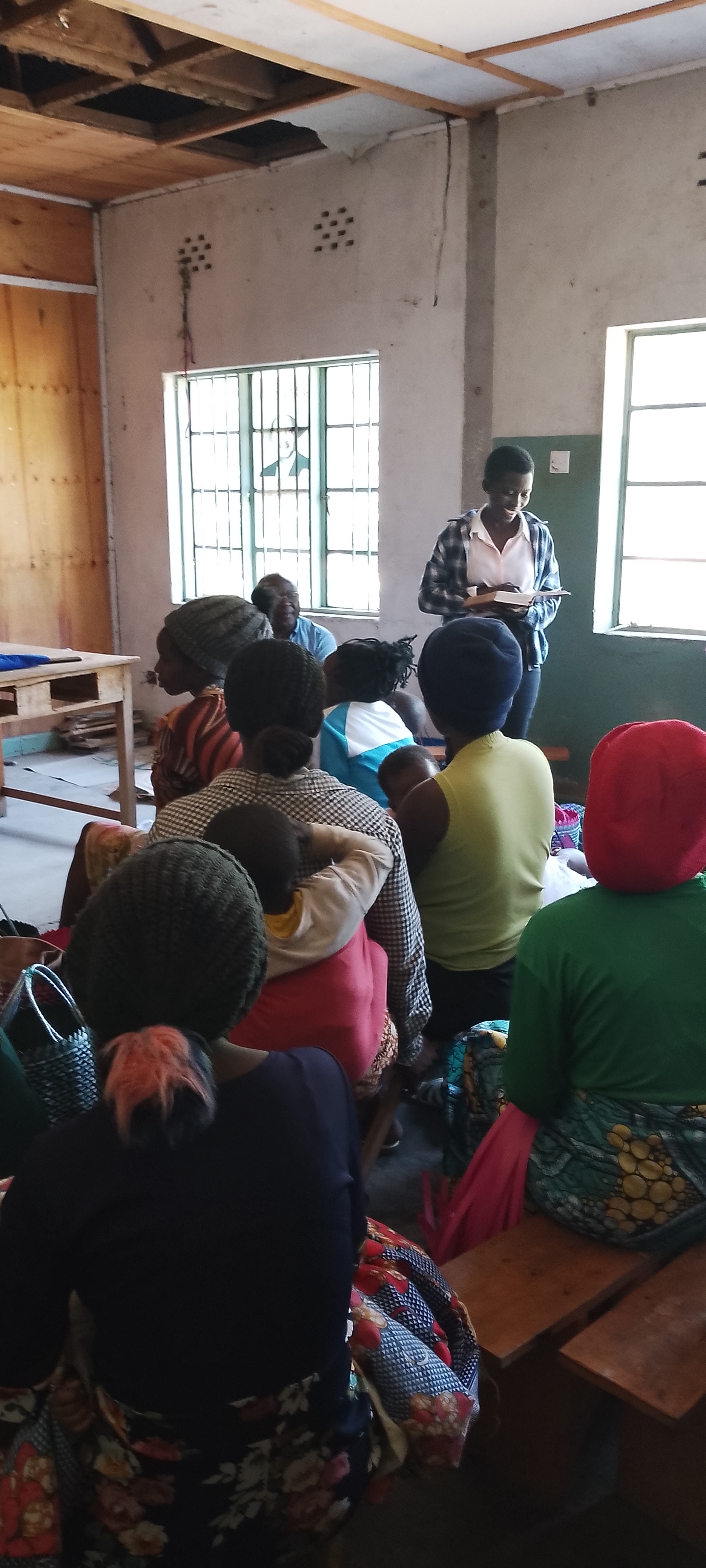 SPES For Community staff take part in a Bible study session.
