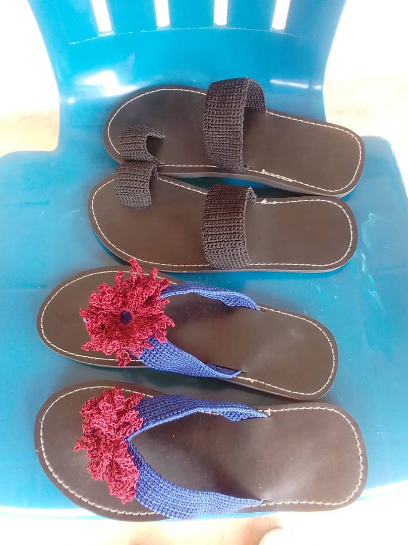 Handmade sandals displayed together.